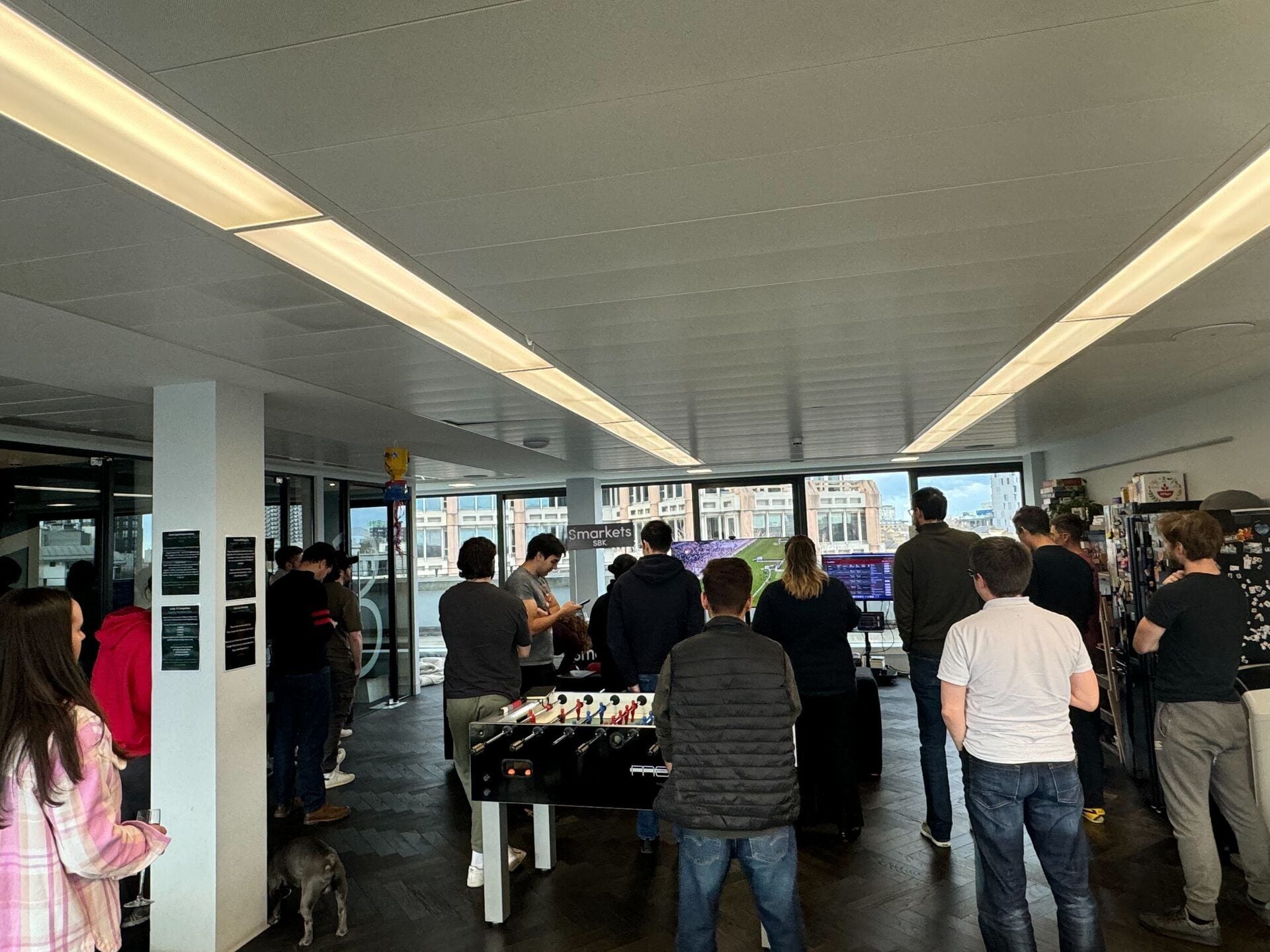 Team watching sport together in the office
